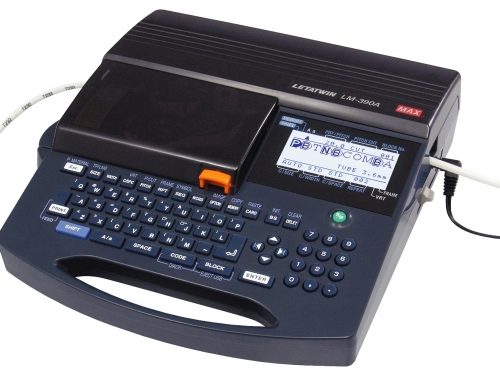Small Letatwin label maker in navy by Brooks Duplicator used to type and print labels.